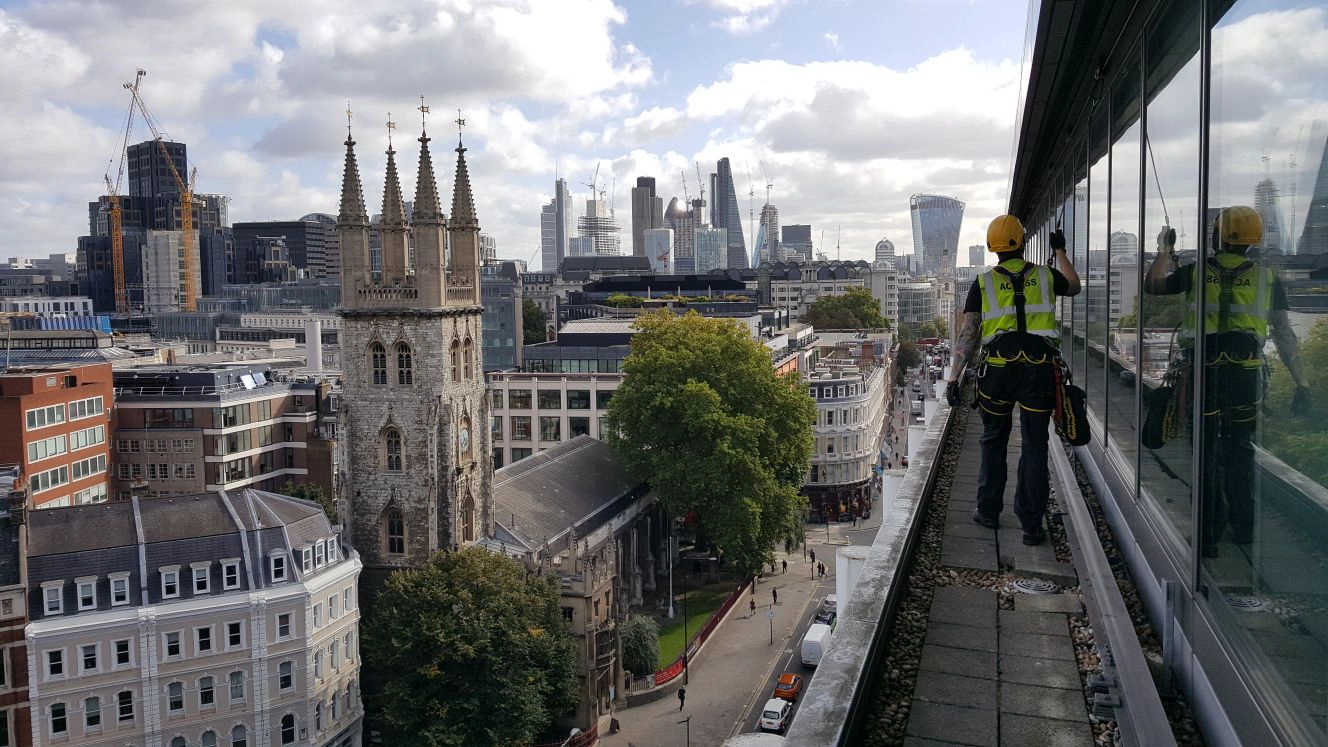 Rope access technician working at height